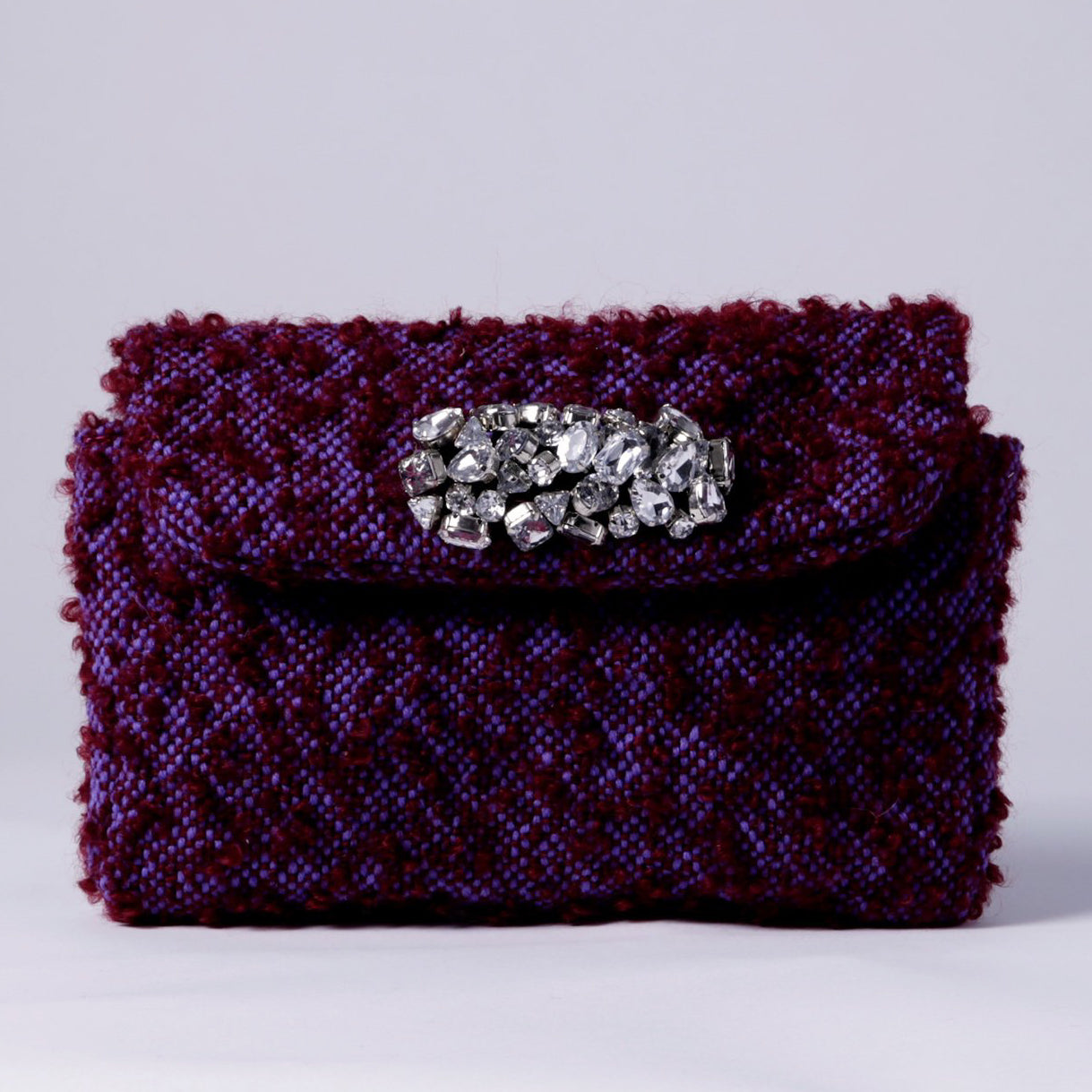 Purple clutch with crystal embellishing Bag